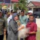 Ketua DPRD Barito Utara Hadiri Restocking Benih Ikan dan Gerakan Pangan Murah di Dam Trinsing